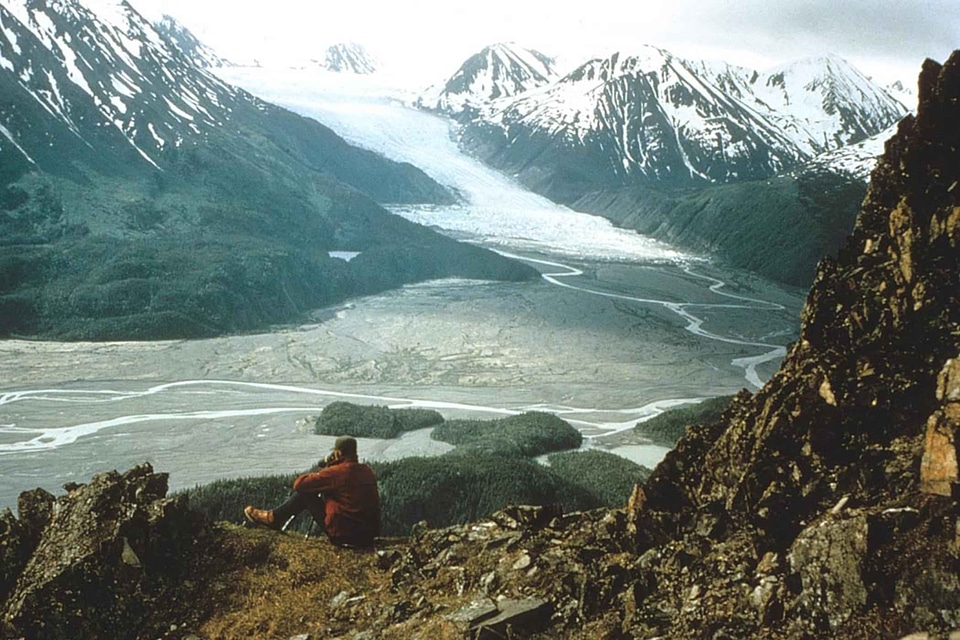 Cliff glacier hiker