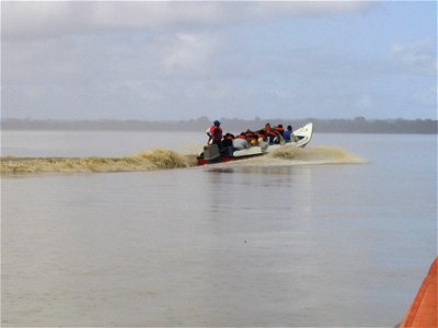 5Speedboat on essiquibo river in rain photo