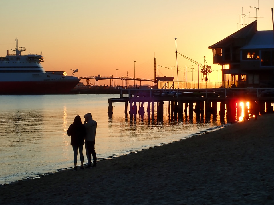 Young couple enjoying the sunset