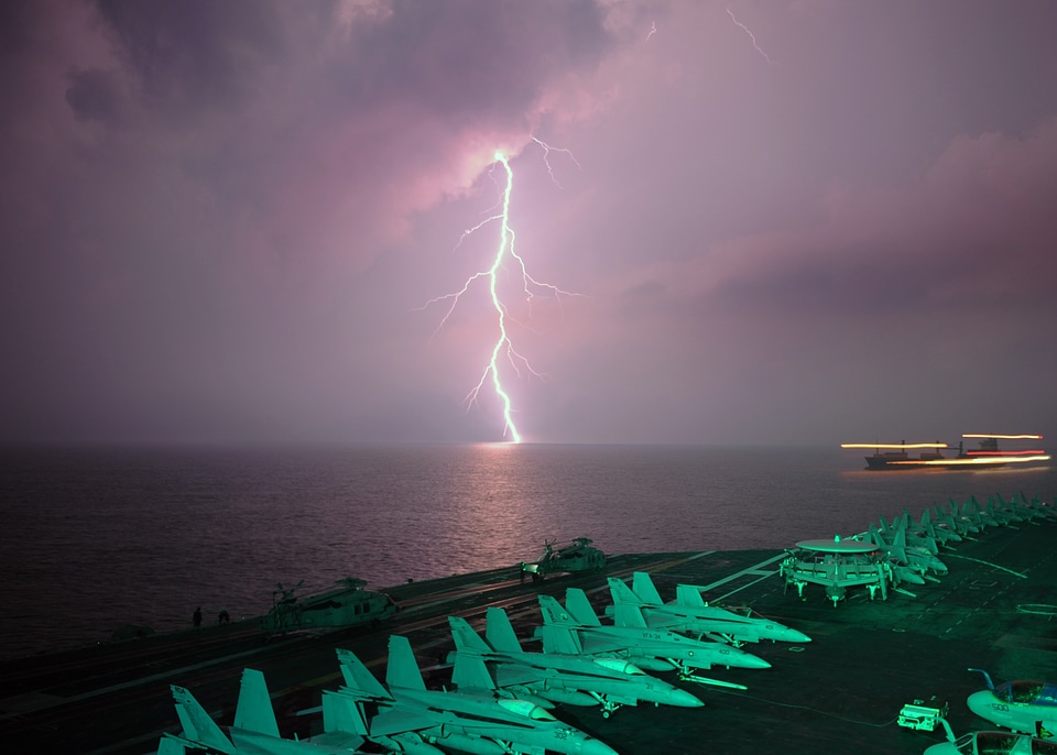 Thunderstorm and lightnings in night over a lake