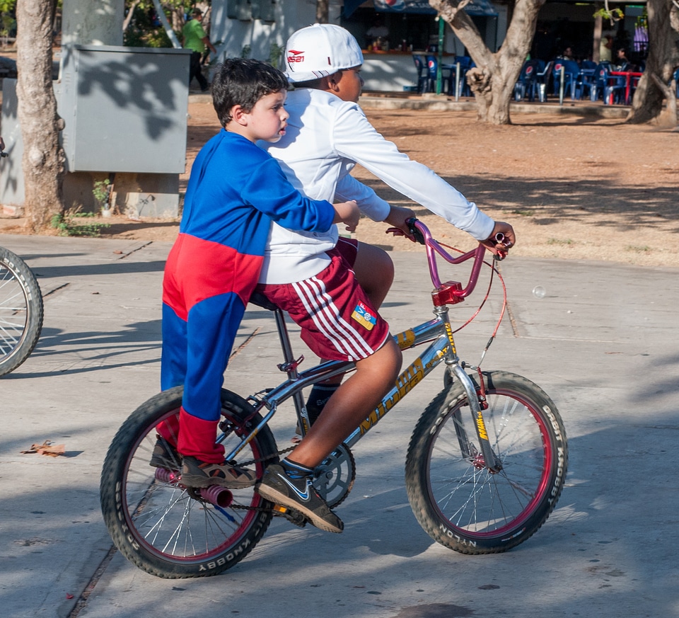 boy riding bike photo