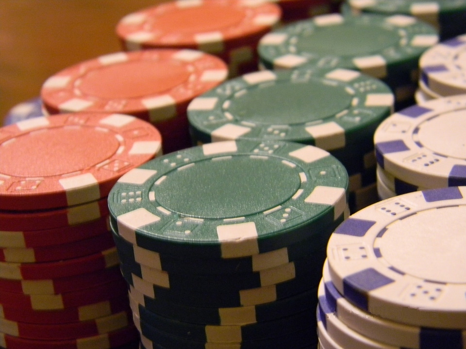 Poker chips on a poker table.