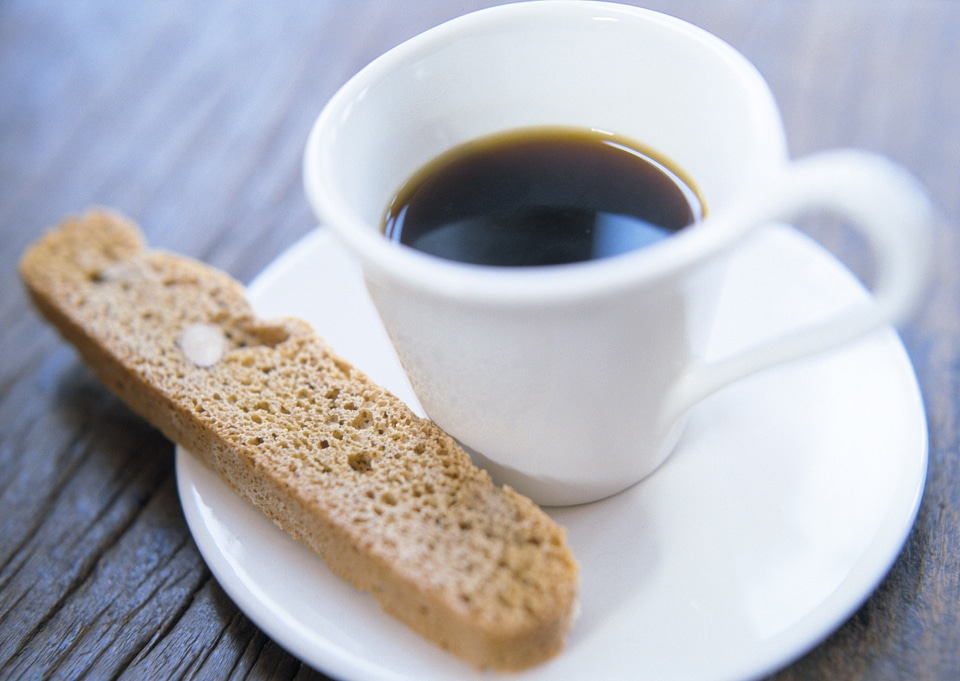 bread stick on wooden floor with coffee
