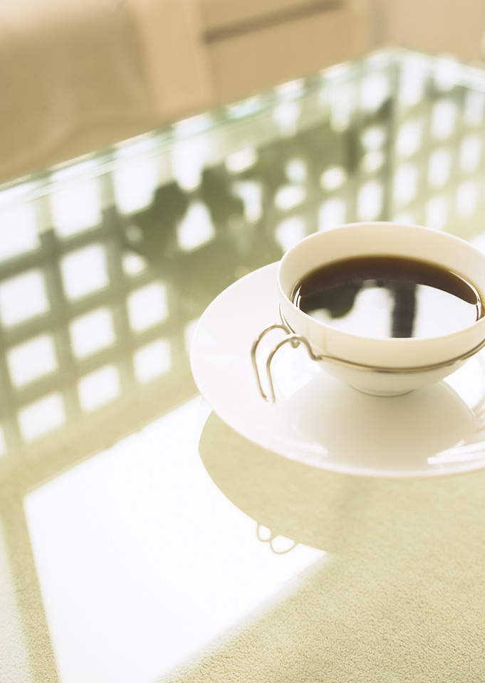 cup of coffee on table in livingroom