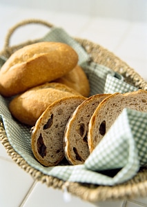 Composition with bread in wicker basket photo