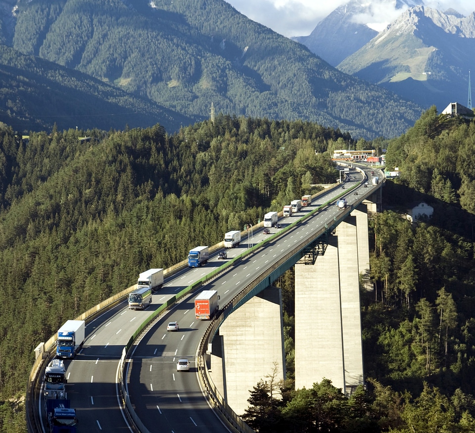 Alpine landscape with motorway pass between Austria and Italy