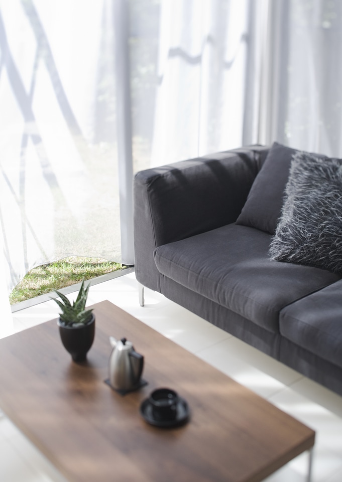 Modern and spacious living room with porch view