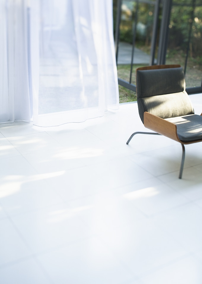 Chair in front of window
