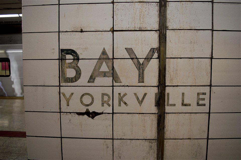 TTC Bay Lower "BAY YORKVILLE" Wall text.