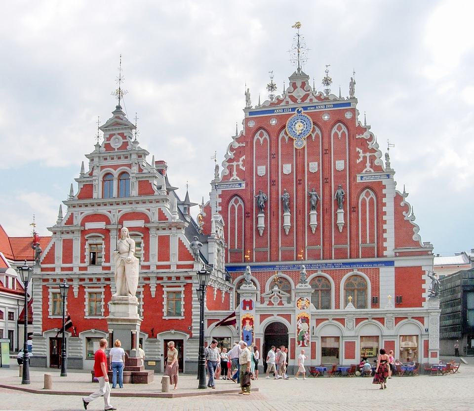 square with unidentified people in the old town in Riga