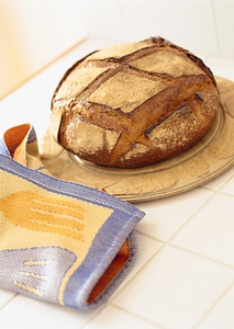 loaf of bread on wooden table