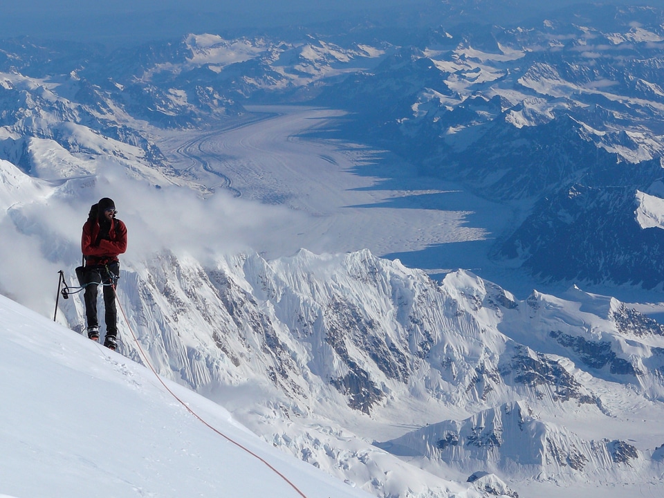 Man on top of mountain