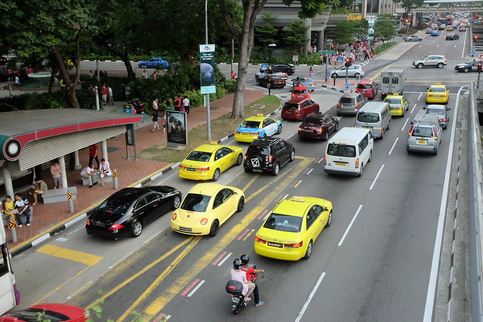 taxi and car on New Bridge Road