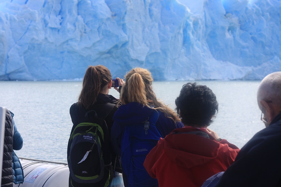 The Perito Moreno glacier collapsing in front of a boat