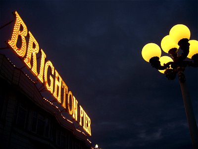 Brighton Pier by night photo