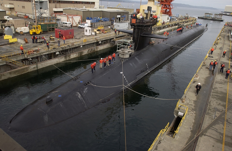 Sailors complete drydocking maneuver of a Trident submarine