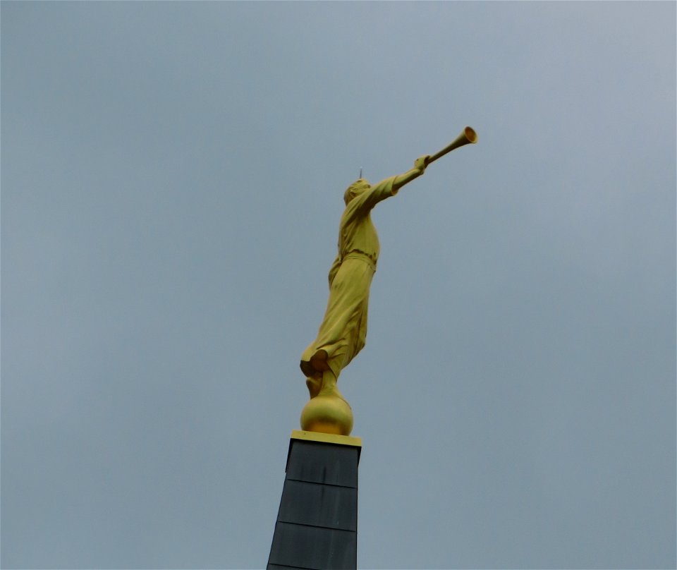 Golden Boy Trumpeter Atop The Steeple at the Church of Jesus Christ of Latter Day Saints in North Calgary