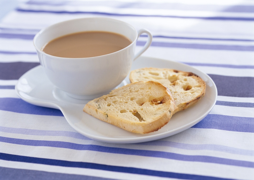 Slices of toasts, coffee cup