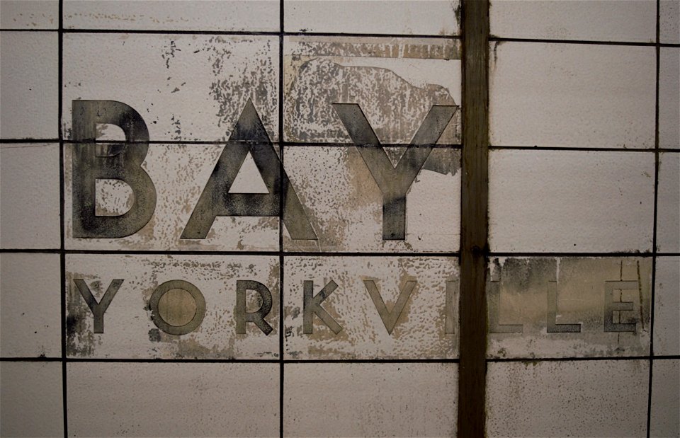 TTC Bay Lower "BAY YORKVILLE" Wall text.
