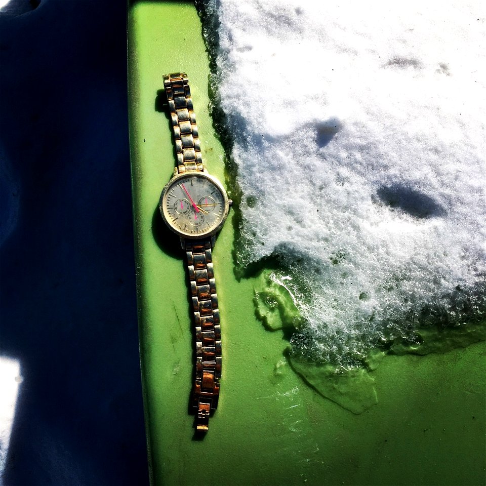 Found item: Green Watch