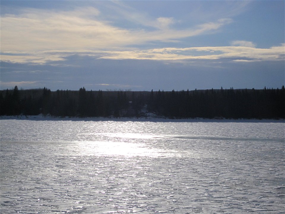Sun On Frozen Reservoir