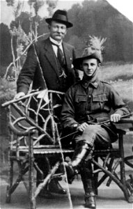 Seated Australian Light Horseman, with an older man (possibly his father), standing behind him. [1914-1918]