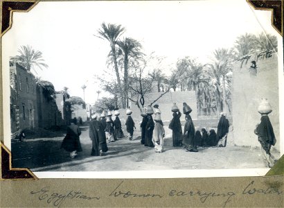Egyptian women carrying water photo