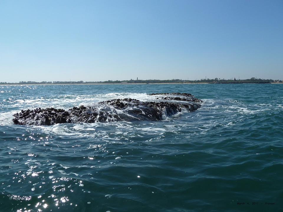 Indian ocean near to famous UNESCO heritage site shore temple photo