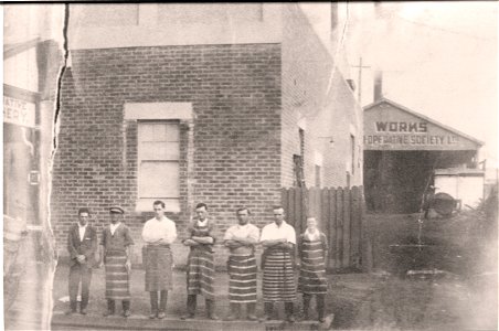 Seven gentlemen, some possibly butchers. [?] Works, Co-operative Society Ltd, [n.d.] photo