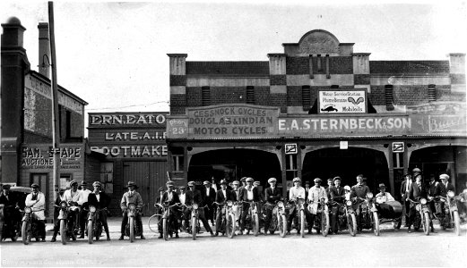 Cessnock Motorcycle Club outside Cessnock Cycles, Douglas & Indian Motor Cycles and E. A. Sternbeck & Son Motor Service Station, 1924