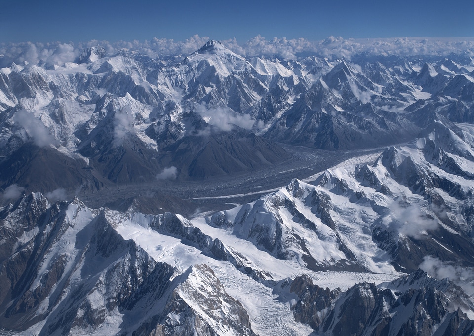 Severe mountains peaks covered by snow