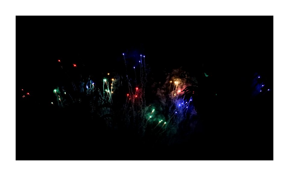 Colorful smoke fills the night