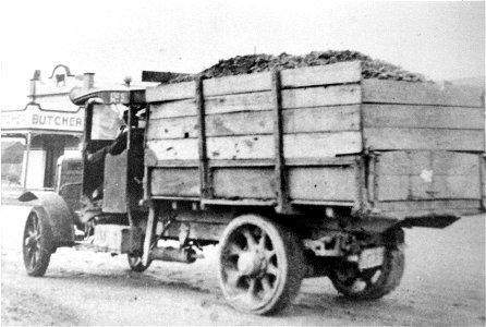 Truck outside a butcher's shop, [n.d.]