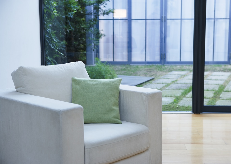 Sofa pront windw toward back yard