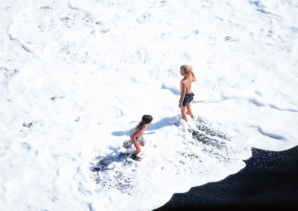 happy kids playing on beach