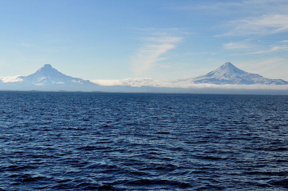 Shishaldin Volcano on the right and Isanotski Volcano