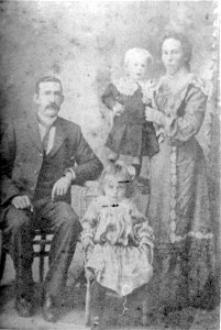 Family photo - parents and two children, [n.d.] photo