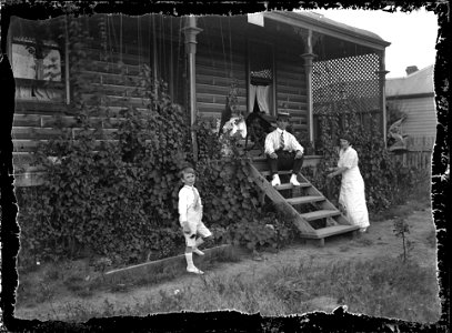 Family in the garden, [n.d.]
