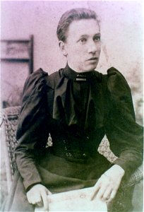 Portrait of a seated lady with book, [n.d.] photo