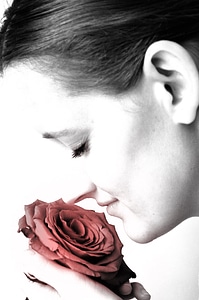 Beautiful Young Caucasian Woman With Rose photo