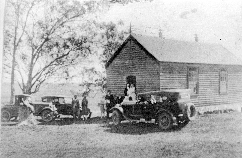 Wedding party outside a country church, Hunter Valley, NSW