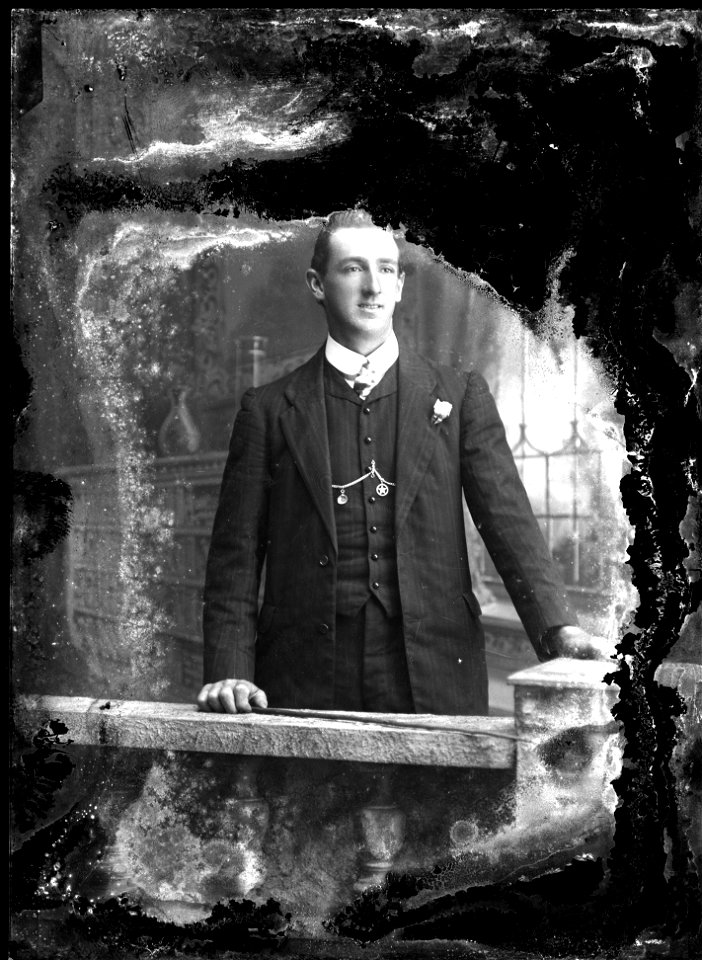 Gentleman at rail, [n.d.]