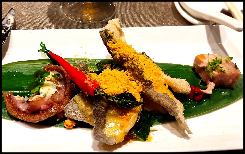 Fied fish skin with egg yolk