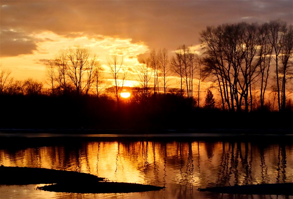 autumn sunset on the river photo