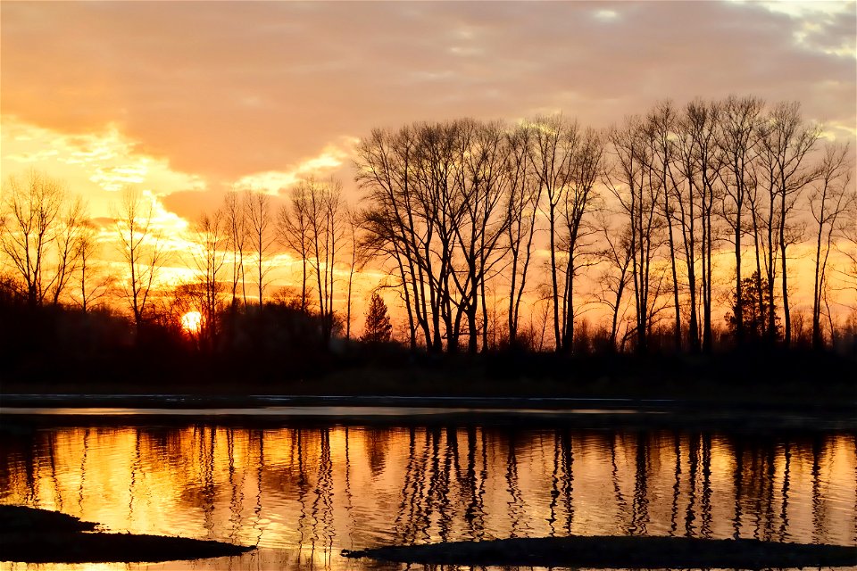 autumn sunset on the river photo