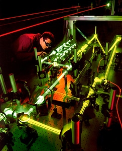 scientist doing research in a quantum optics lab
