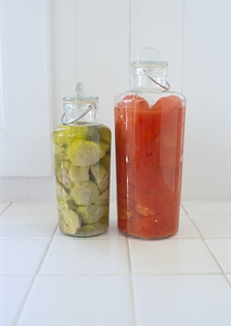 Jars with fruity compotes pickled photo
