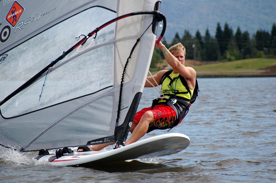 young windsurfer passing by