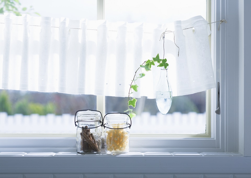 home interior decoration: the branches in vintage bottles