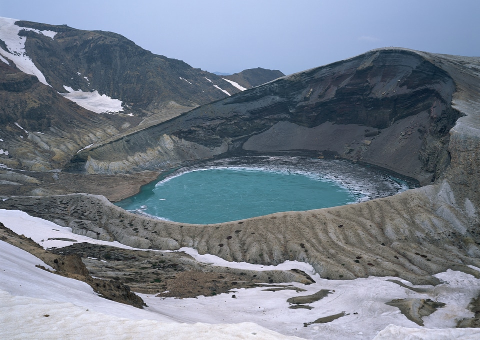 Steaming volcanic colorful lakes